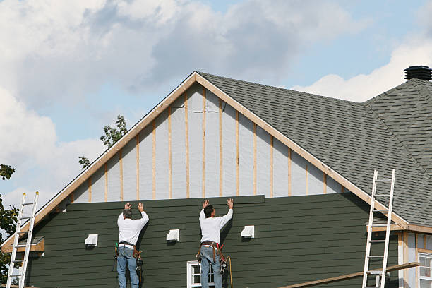 Professional Siding Installation technician working in Woodbine, GA